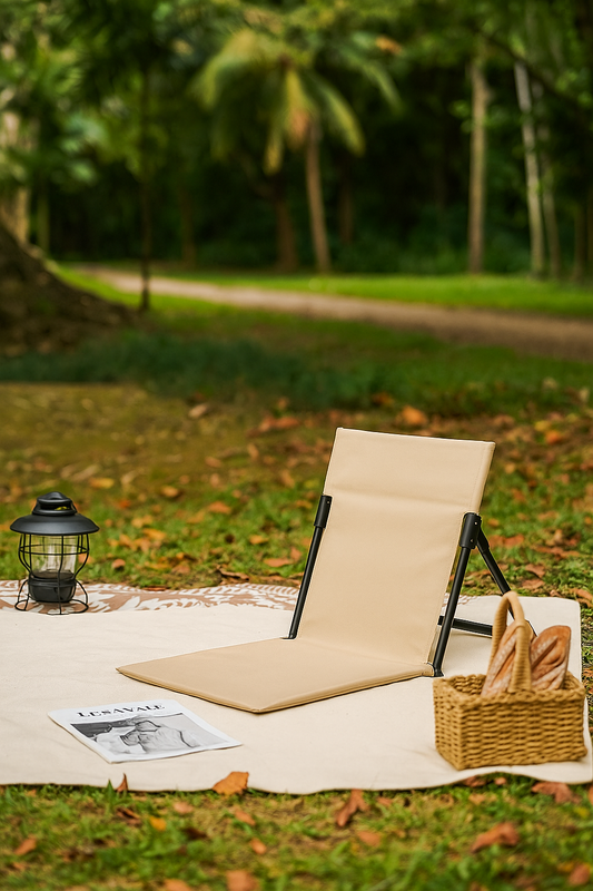 foldable_backrest_floor_chair_for_outdoor_picnic_in_beige_on_grass_mat